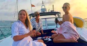 Georgia Hirst with close friends on a boat in vacation mode